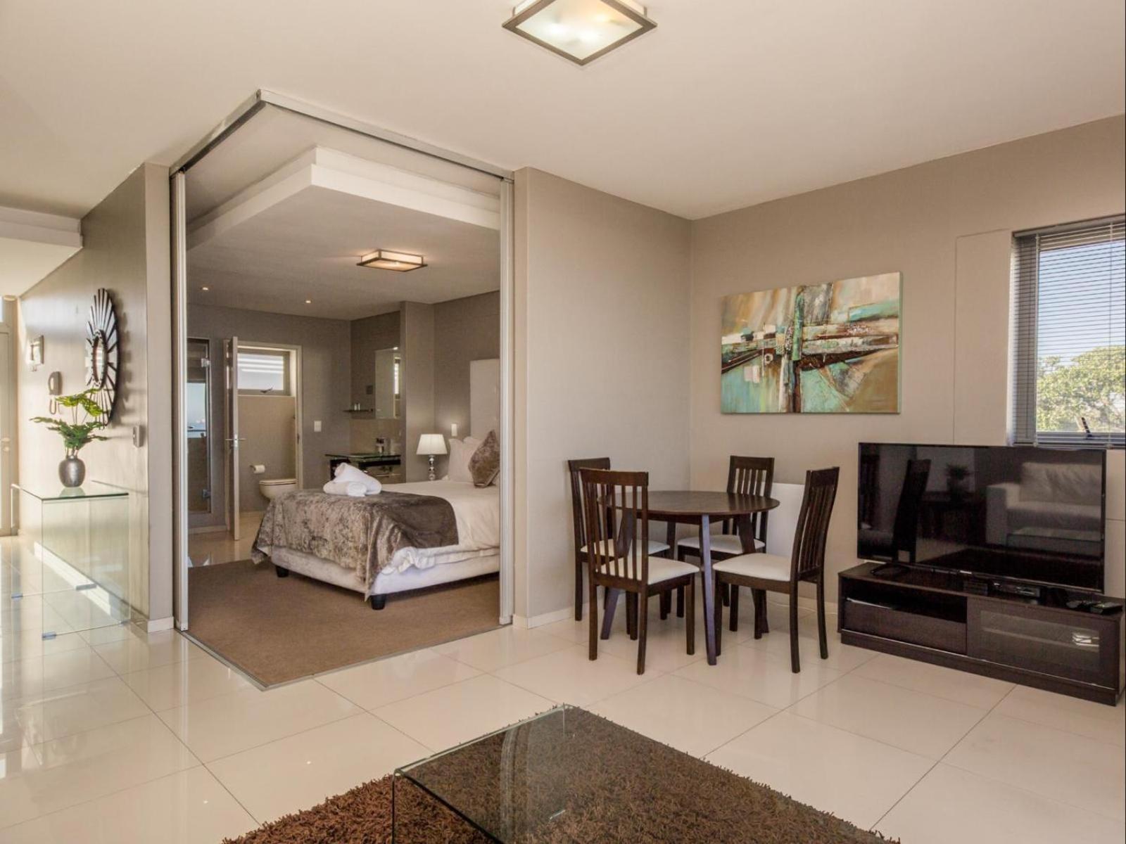 Infinity Self Catering Apartments โบลแบร์กสตรานด์ ภายนอก รูปภาพ
