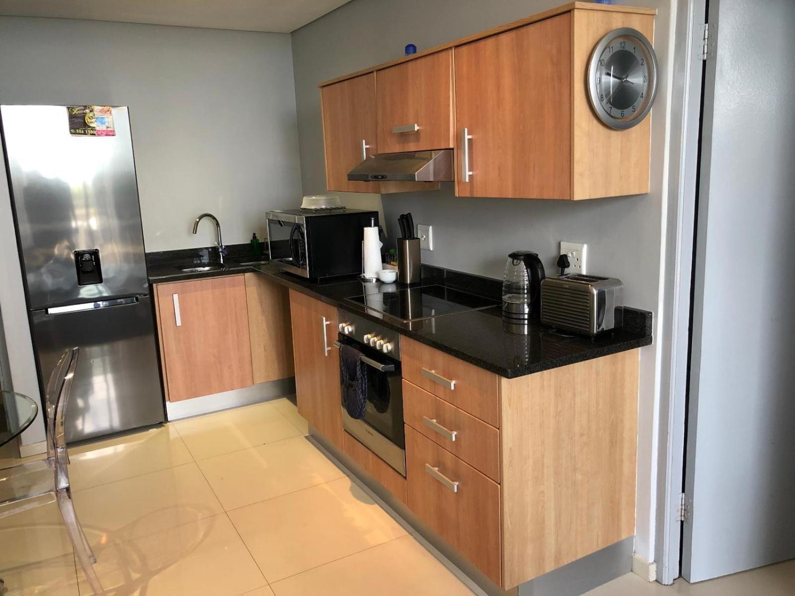 Infinity Self Catering Apartments โบลแบร์กสตรานด์ ภายนอก รูปภาพ
