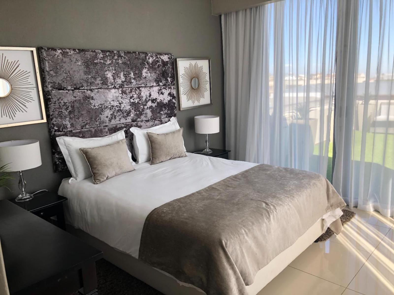Infinity Self Catering Apartments โบลแบร์กสตรานด์ ห้อง รูปภาพ